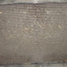 забитый пухом радиатор